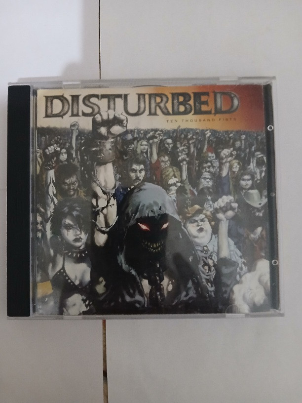 آلبوم موسیقی اوریجینال آلترناتیو متال/نئومتال Disturbed 2005 ارسال با دفترچه کامل